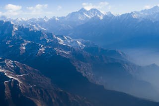 A vista over a misty mountain range